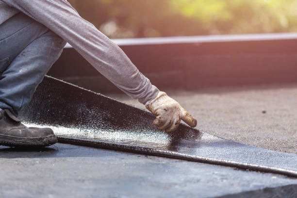 Professional Basement Waterproofing technician working in Barnesville, OH